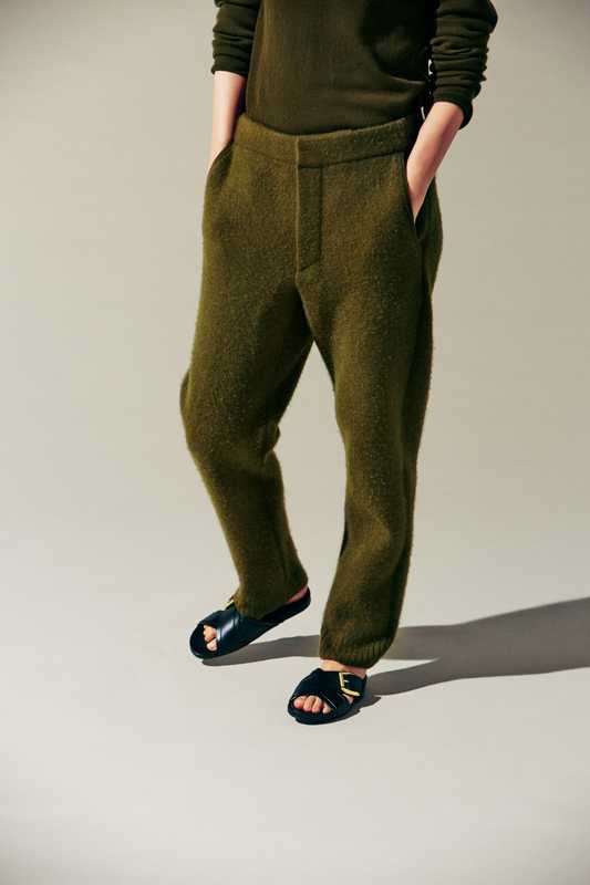 Jumper and trousers by Berluti,  sandals by J&M Davidson