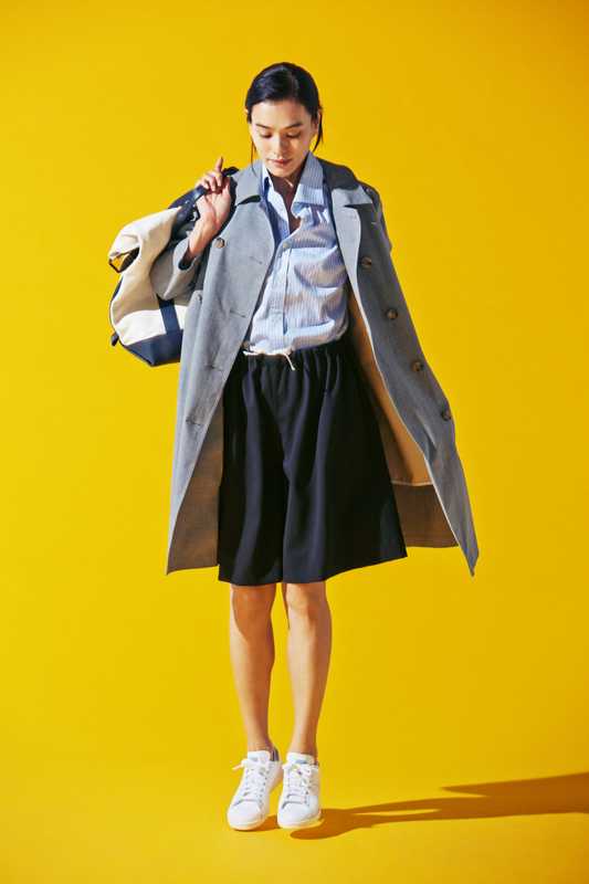 Coat by Mackintosh, shirt by Orazio Luciano, shorts by Sofie D’Hoore, trainers by Adidas, bag by Sacai