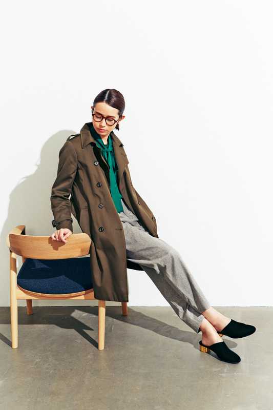 Coat by Sealup, shirt by Golden Goose Deluxe Brand, trousers by De Bonne Facture, shoes by Salvatore Ferragamo, glasses by Cutler and Gross chair by Maruni