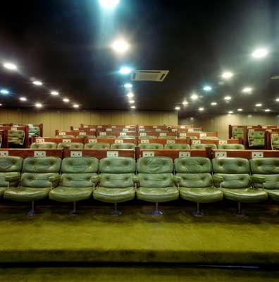 Room used for press conferences, with headphone sockets for simultaneous translation