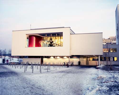 View of the side of the hospital with the cafeteria and fire escape on show  