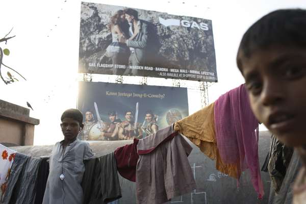 Brand ads make a poignant backdrop to the slums