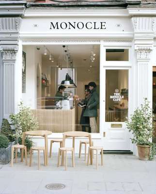 The café front opens onto a wide pavement for al fresco lunches