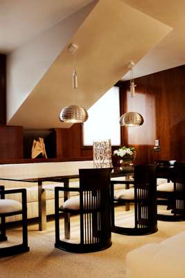 Carlo Scarpa dining table and Frank Lloyd Wright chairs