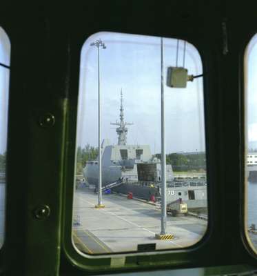 Frigate at dock in Changi naval base