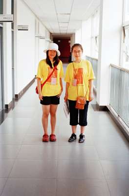 Lu Sisil (left) and Ai Yafang, Chinese volunteer students