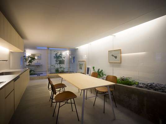 Kitchen with furniture designed by Tanijiri (except chairs). Let’s hope the plants grow a bit, for modesty’s sake