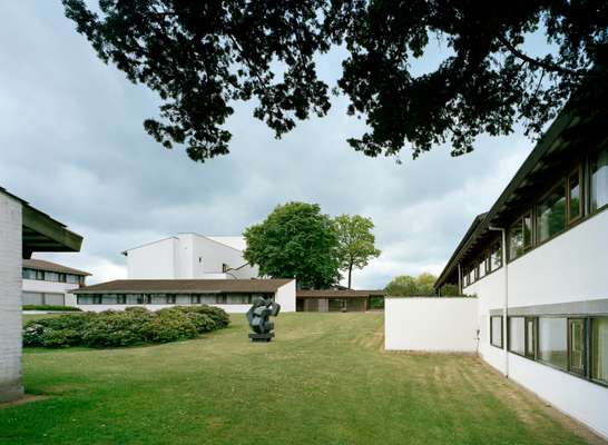 The campus is interspersed with green parkland