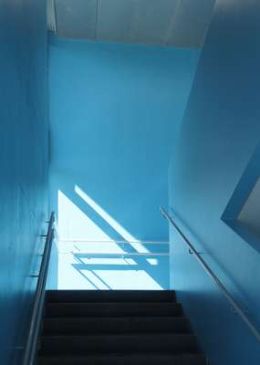 Colour is used in the stairwells to mark floors