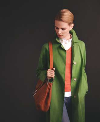 Coat by Mackintosh, v-neck jumper by Zanone, shirt and jeans by Maison Kitsuné, bag by Delvaux