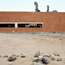 Cooking school’s brick building sits on a desert mountain
