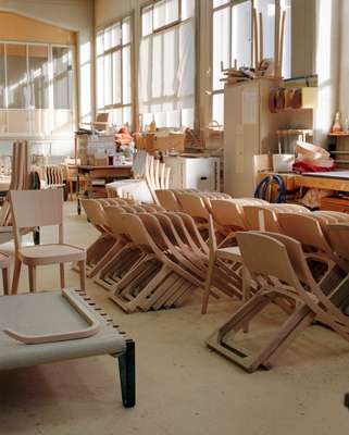 Unfinished Lyra chairs awaiting assembly