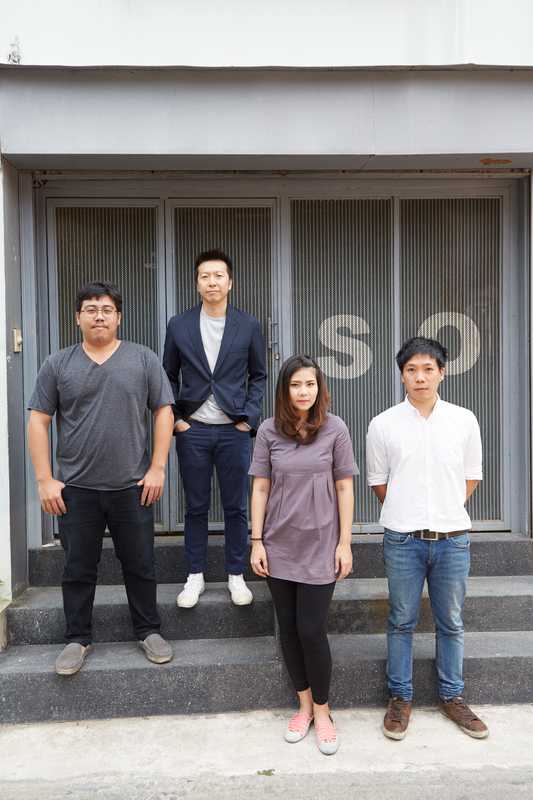 Narong Othavorn  (second from left) with his team outside the  So office
