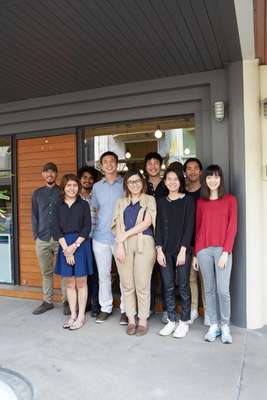 Chat Architects team, including Chatpong Chuenrudeemol (fourth from left), in front of their office in Bangkok