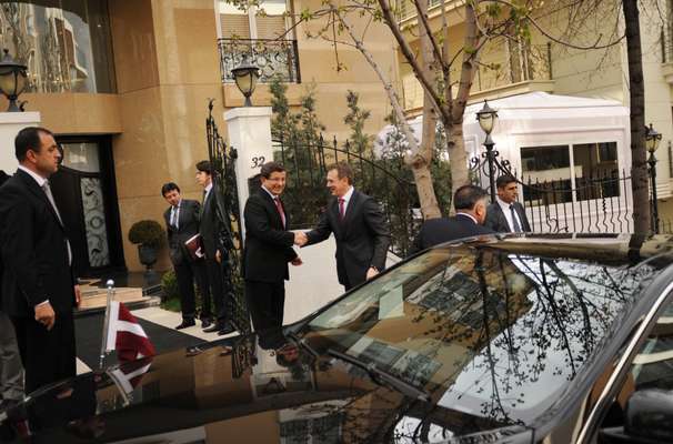 Davutoglu greets the Latvian minister of foreign affairs