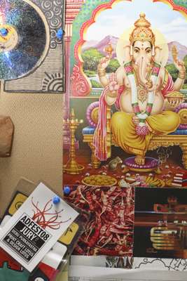 Ganesh and guestlist badges mix at the modern Mumbai ad agency