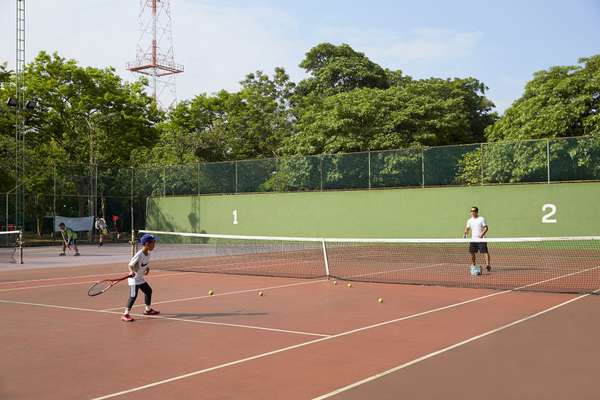 Father and son at Ari tennis club