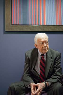 Former president Jimmy Carter takes a moment to reflect during his visit to London