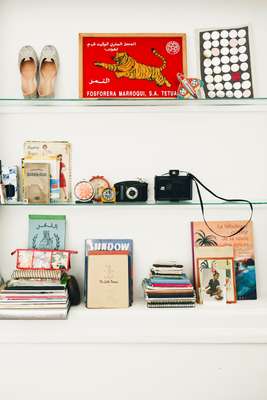 Shelves of souvenirs at Julie Klear’s house