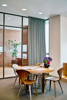Executive offices use mid-century chairs by Norman Cherner