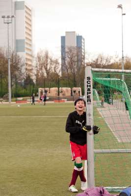 Anh Tuan, 12, playing football
