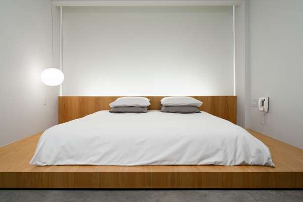 Each room has a Japanese-style platform bed