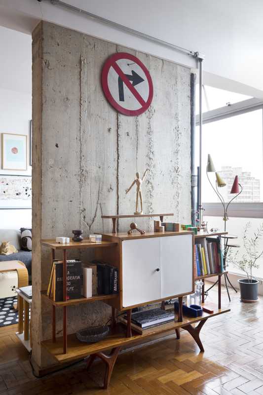 Refurbishment has revealed the building’s concrete structure in their apartment