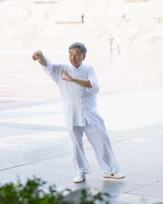 Resident practising tai chi in the People's Square