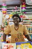 Shop owner at Cayenne’s fish market 