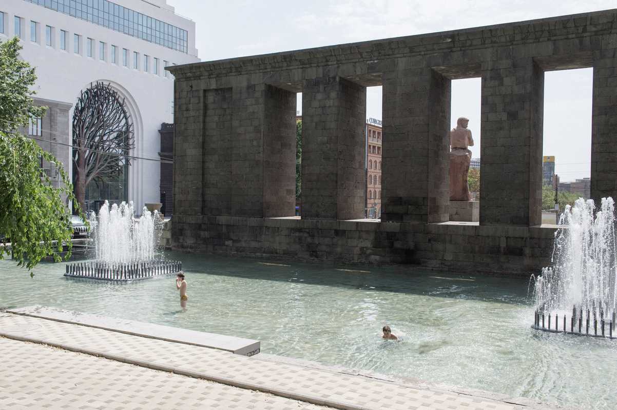 Cooling off in a pool beside the monument of Stepan Shahumyan 