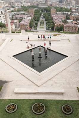 Sightseers on top of The Cascade imitating UK artist David Martin’s ‘The Three Divers’ 