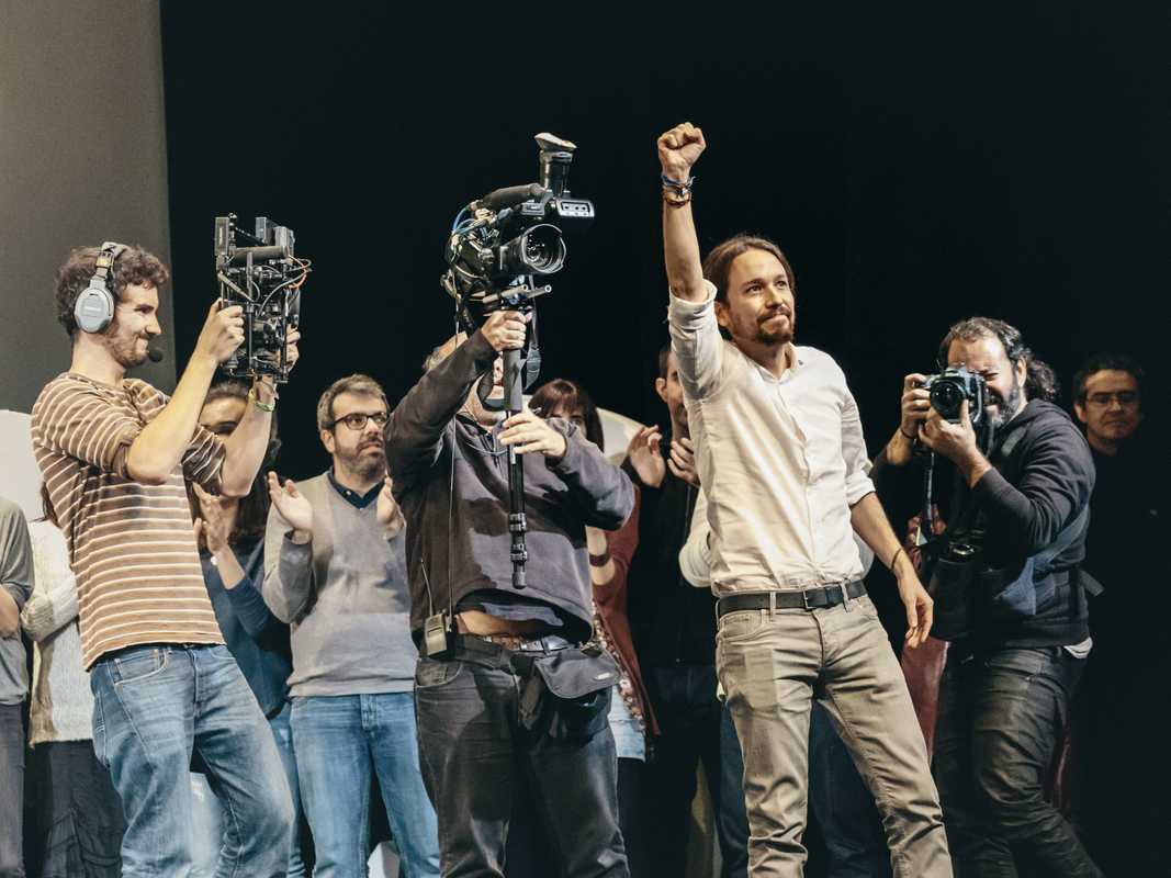 Pablo Iglesia celebrates being voted Podemos party leader at a rally