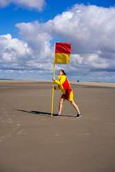 Lifeguard braving the wind