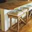 Wooden counter with benches by Takanori Ota of OFC