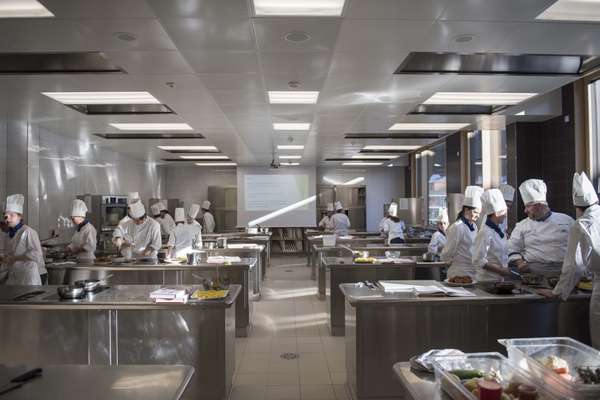 Students practising during a cooking class