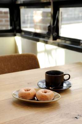 Doughnuts and coffee on Truck crockery