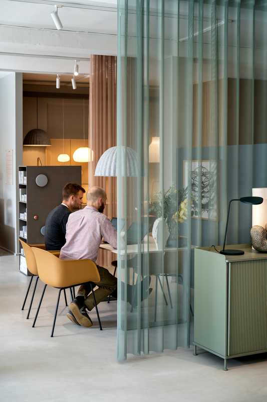 Muuto employees using the showroom