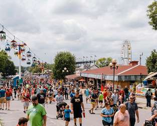 Iowans strolling the fair’s main drag