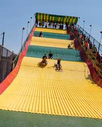 Burlap sacks ahoy for a ride on the cunningly named Giant Slide, recently braved by presidential aspirant Pete Buttigieg