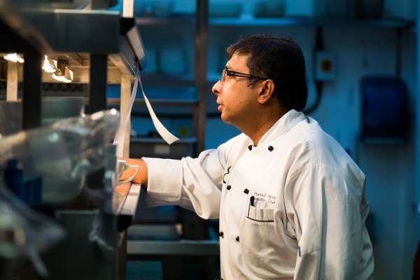 Executive chef Prahlad Hegde monitors service