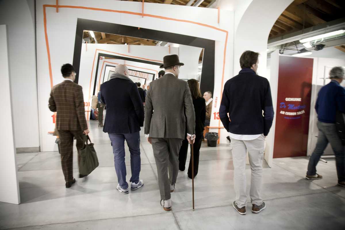 Visitors to the 83rd edition of Pitti Uomo