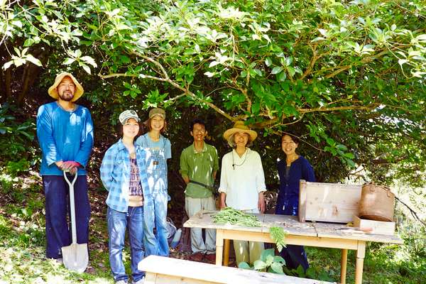 Locals working on shared farmland