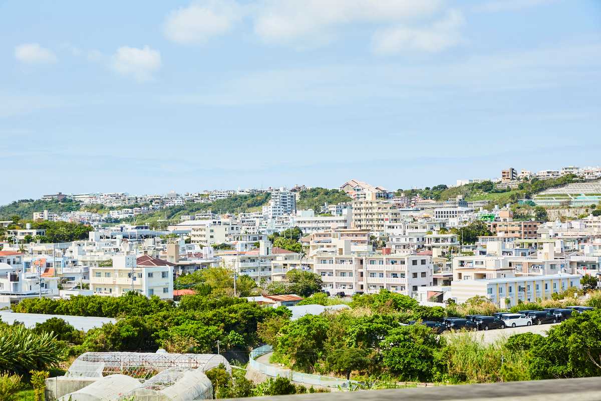 Leafy landscape and low-rise block structures in Okinawa 