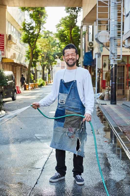 Tatsuya Yoneki in his custom-made denim patchwork apron