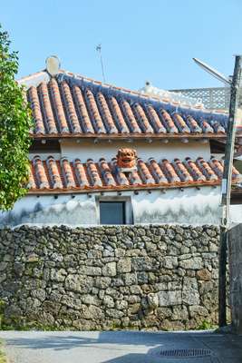 Vivid Okinawan red roof tiles in Naha