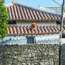 Vivid Okinawan red roof tiles in Naha