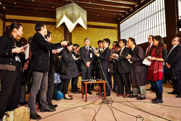 Media scrum at Iikura Guest House
