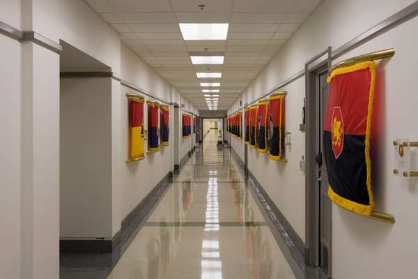 A Pentagon corridor displaying the flags of the National Guard