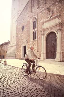 Cyclist outside the cathedral
