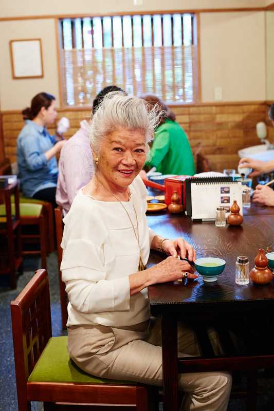 Junko Shimada seated at her usual table